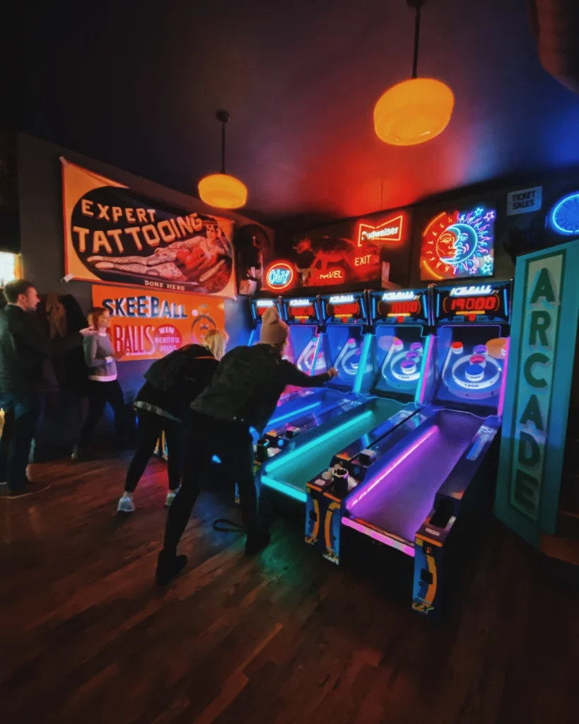 Friends playing games at the arcade