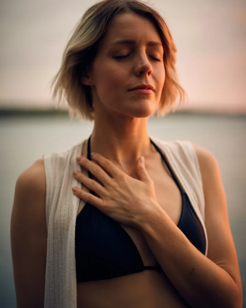 Woman doing breathwork outdoors