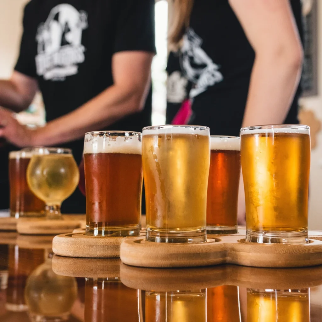 An array of craft beers at a brewery