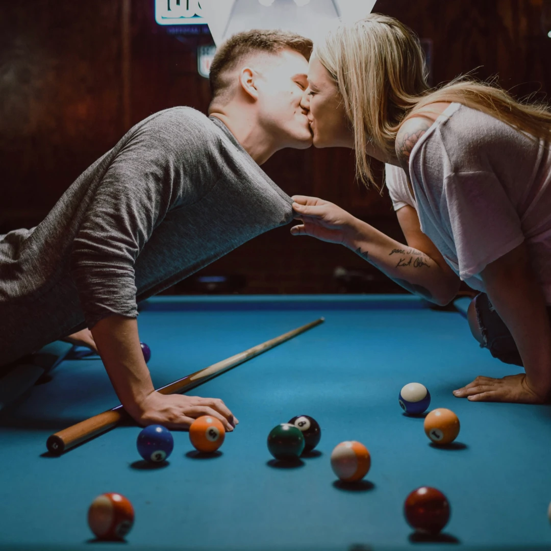 game-of-pool Couple kissing over a game of pool
