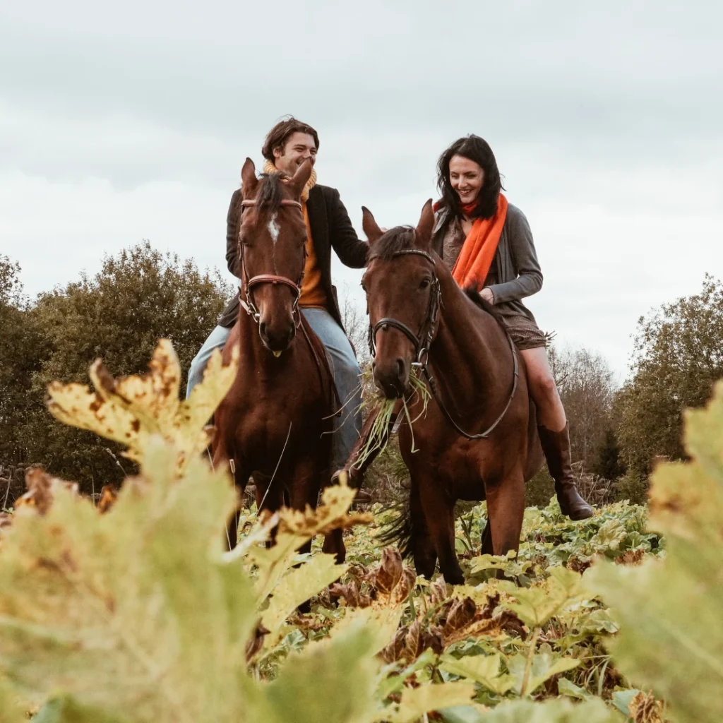 Couple horseback riding