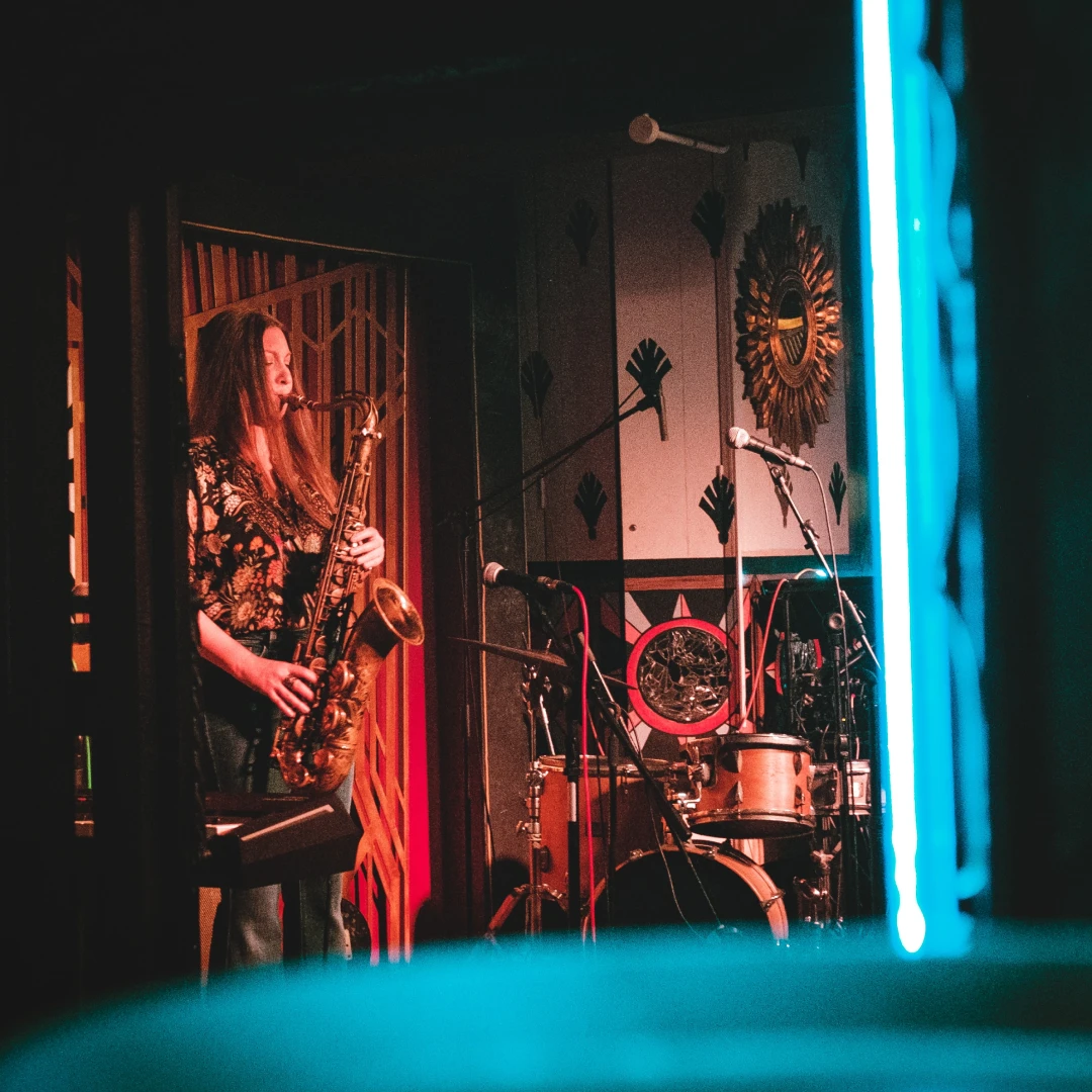 jazz-club Saxophonist performing in a cool jazz club