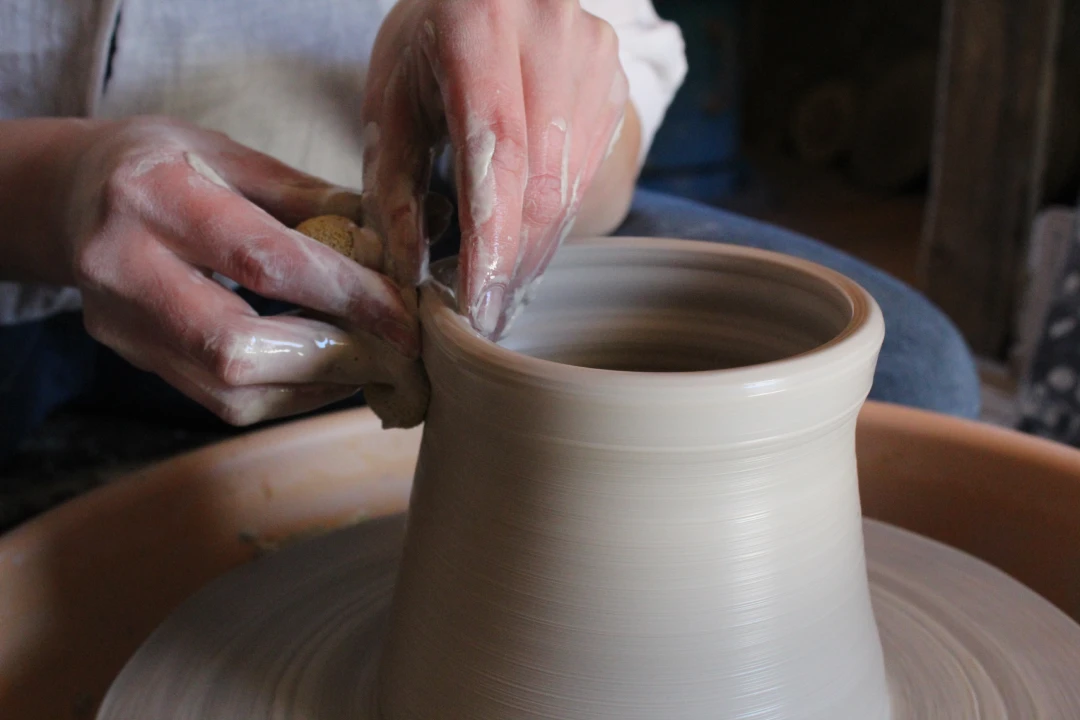 pottery-class Close up of a person doing pottery